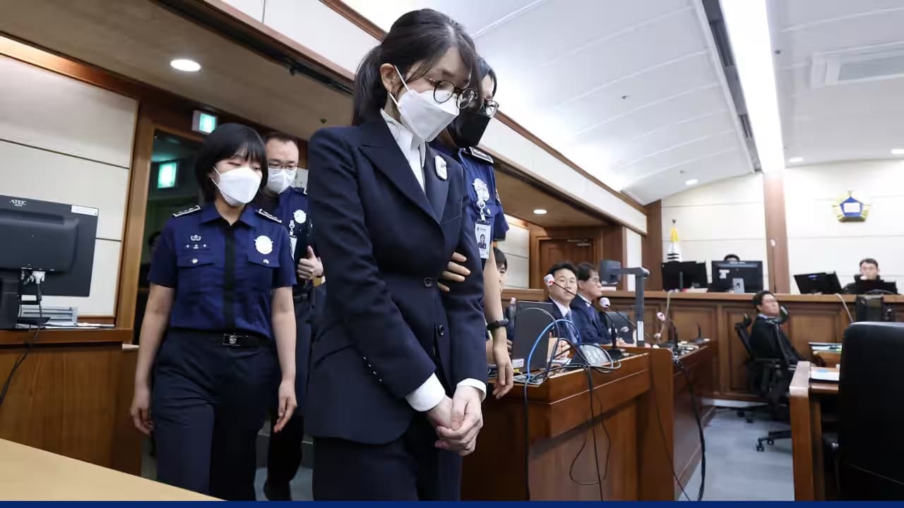 Former South Korean first lady escorted during courtroom conviction proceedings