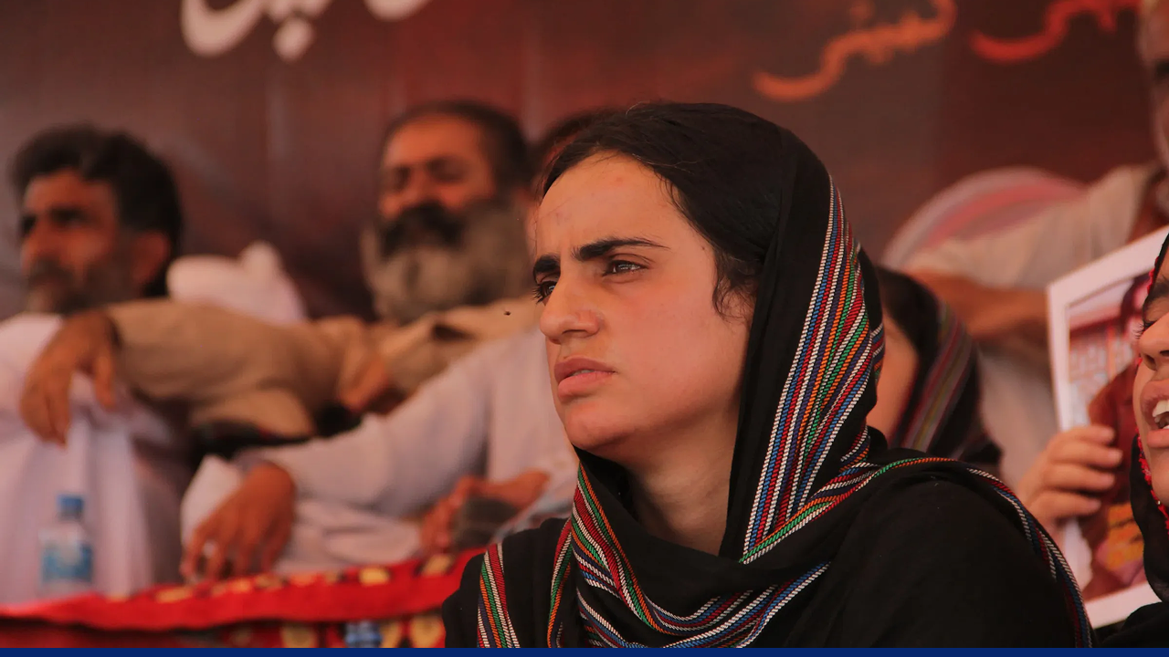 Mahrang Baloch, a human rights activist from Balochistan, looks on with hope during a public gathering, symbolizing resilience amid ongoing calls for justice and autonomy