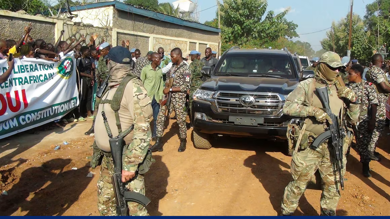 Russian officers from the Wagner group, who are part of the presidential security system, surround Central African Republic President Faustin-Archange Touadéra in Bangui